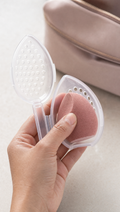 Person using Makeup Sponge Travel Case in a realistic lifestyle scene