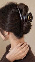 Person using Large Hair Claw Clip in a realistic lifestyle scene